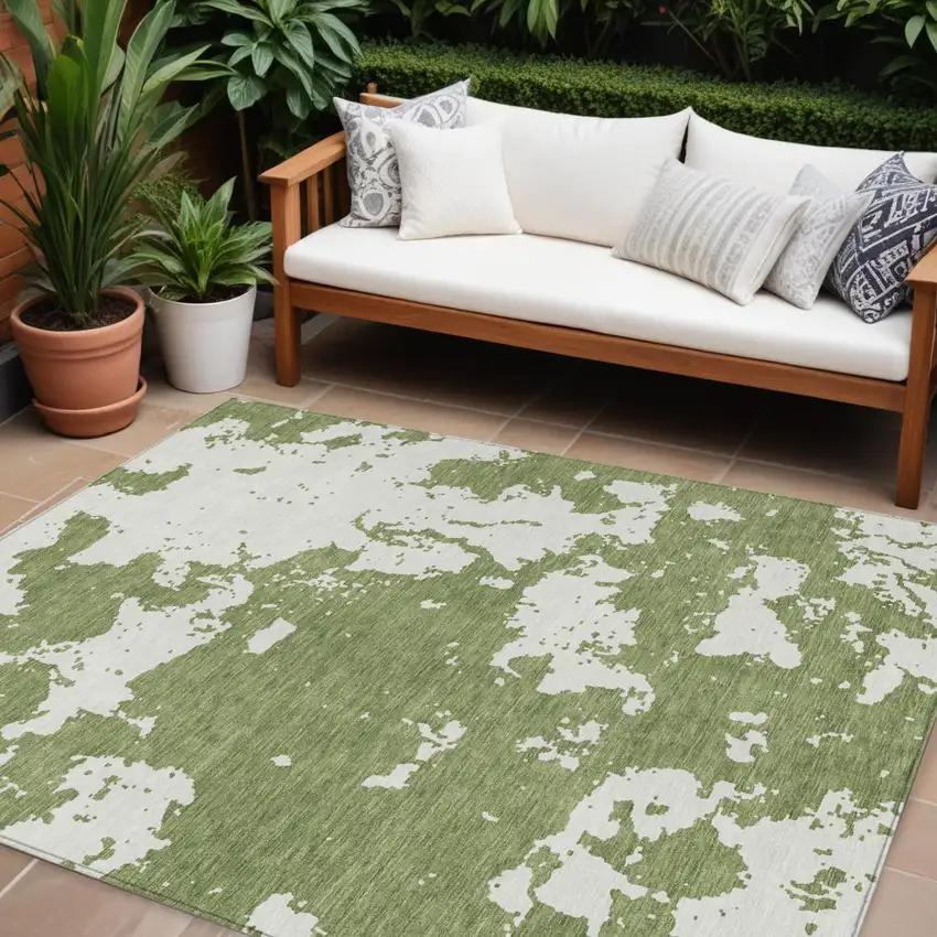 Green And Ivory Abstract Washable Indoor Outdoor Area Rug Photo 1