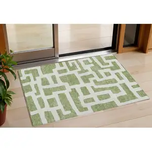 Photo of Green And Ivory Abstract Washable Indoor Outdoor Area Rug