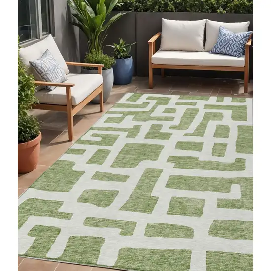 Green And Ivory Abstract Washable Indoor Outdoor Area Rug Photo 1