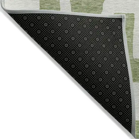 Green And Ivory Abstract Washable Indoor Outdoor Area Rug Photo 4