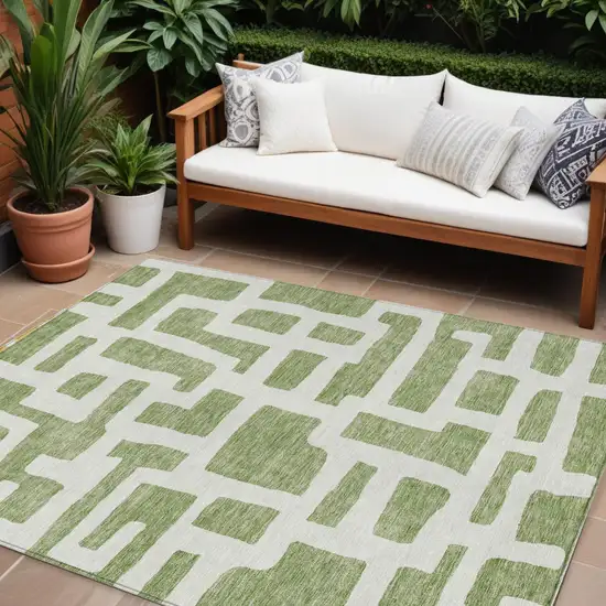 Green And Ivory Abstract Washable Indoor Outdoor Area Rug Photo 1