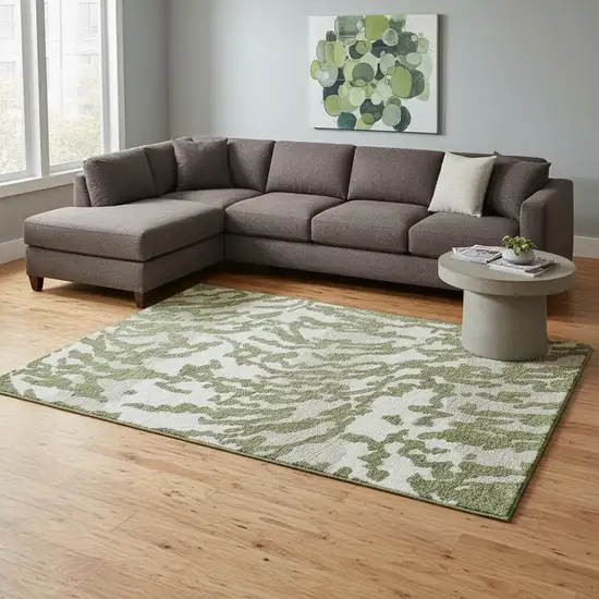 Green And Ivory Animal Print Washable Area Rug With UV Protection Photo 2
