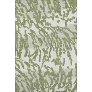 Photo of Green And Ivory Animal Print Washable Area Rug With UV Protection