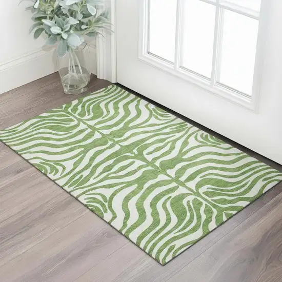 Green And Ivory Animal Print Washable Area Rug With UV Protection Photo 2