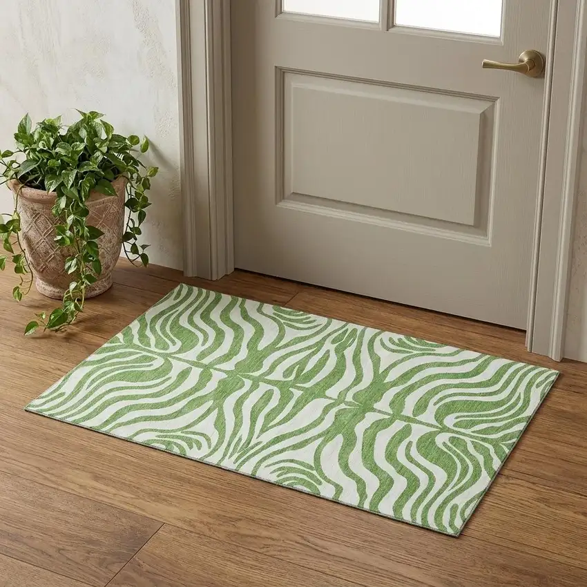 Green And Ivory Animal Print Washable Area Rug With UV Protection Photo 1