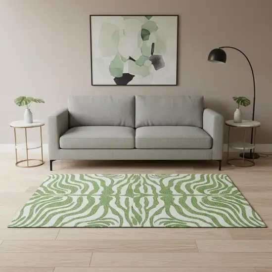 Green And Ivory Animal Print Washable Area Rug With UV Protection Photo 2