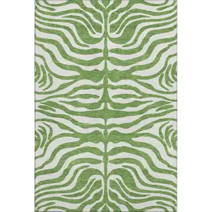 Photo of Green And Ivory Animal Print Washable Area Rug With UV Protection