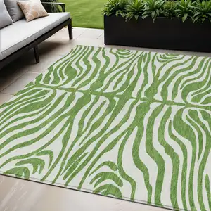 Photo of Green And Ivory Animal Print Washable Indoor Outdoor Area Rug