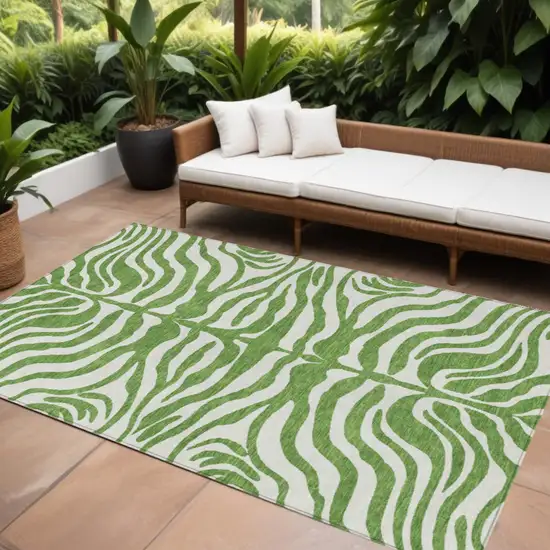 Green And Ivory Animal Print Washable Indoor Outdoor Area Rug Photo 1