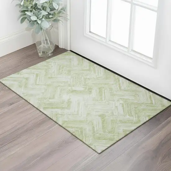 Green And Ivory Chevron Washable Area Rug With UV Protection Photo 1