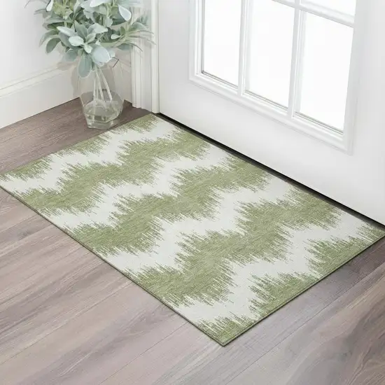 Green And Ivory Chevron Washable Area Rug With UV Protection Photo 1