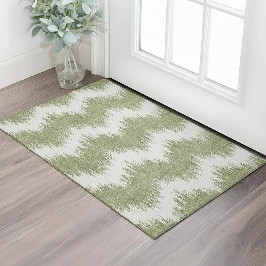 Green And Ivory Chevron Washable Area Rug With UV Protection Photo 1