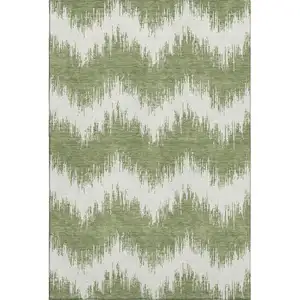 Photo of Green And Ivory Chevron Washable Area Rug With UV Protection