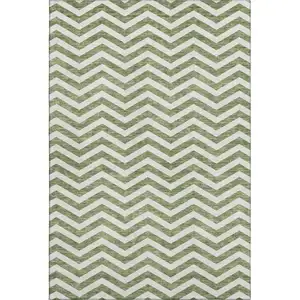 Photo of Green And Ivory Chevron Washable Area Rug With UV Protection