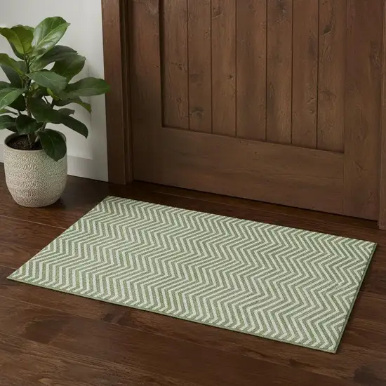 Green And Ivory Chevron Washable Area Rug With UV Protection Photo 1