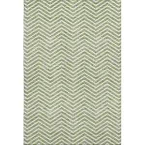 Photo of Green And Ivory Chevron Washable Area Rug With UV Protection