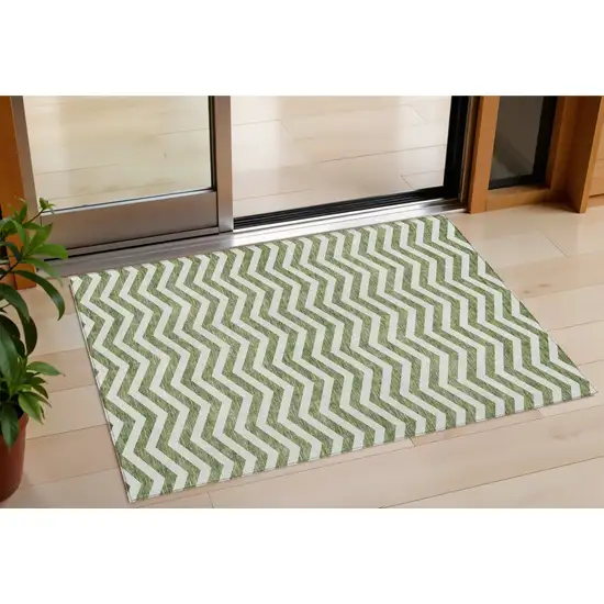 Green And Ivory Chevron Washable Indoor Outdoor Area Rug Photo 1