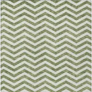 Photo of Green And Ivory Chevron Washable Indoor Outdoor Area Rug