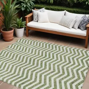 Photo of Green And Ivory Chevron Washable Indoor Outdoor Area Rug