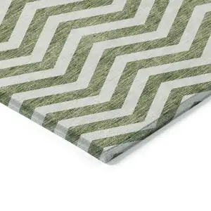 Photo of Green And Ivory Chevron Washable Indoor Outdoor Area Rug