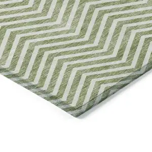 Photo of Green And Ivory Chevron Washable Indoor Outdoor Area Rug