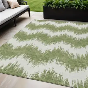 Photo of Green And Ivory Chevron Washable Indoor Outdoor Area Rug