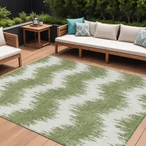 Photo of Green And Ivory Chevron Washable Indoor Outdoor Area Rug