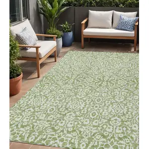 Photo of Green And Ivory Damask Washable Indoor Outdoor Area Rug