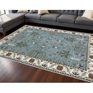 Photo of Green And Ivory Floral Area Rug With Fringe