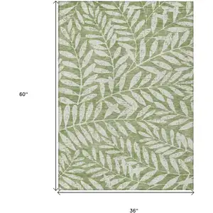 Photo of Green And Ivory Floral Washable Indoor Outdoor Area Rug