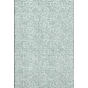 Photo of Green And Ivory Geometric Washable Area Rug With UV Protection