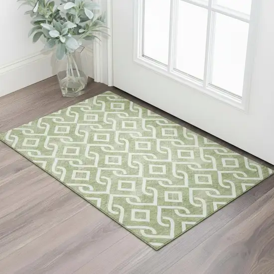 Green And Ivory Geometric Washable Area Rug With UV Protection Photo 1