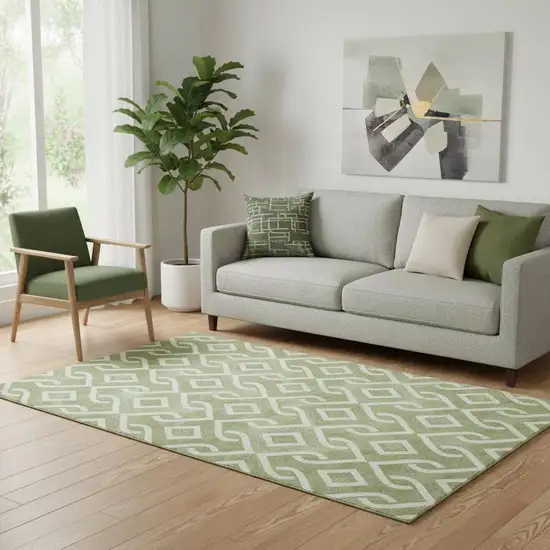 Green And Ivory Geometric Washable Area Rug With UV Protection Photo 1