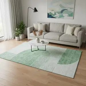 Photo of Green And Ivory Geometric Washable Area Rug With UV Protection
