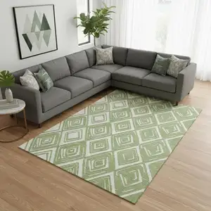 Photo of Green And Ivory Geometric Washable Area Rug With UV Protection