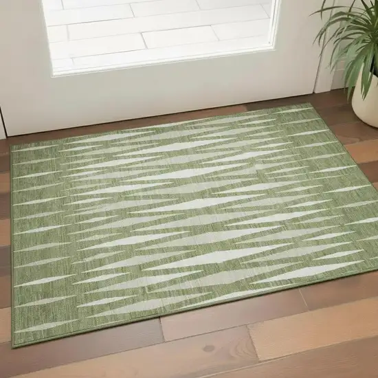 Green And Ivory Geometric Washable Area Rug With UV Protection Photo 1
