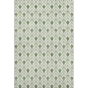 Photo of Green And Ivory Geometric Washable Area Rug With UV Protection
