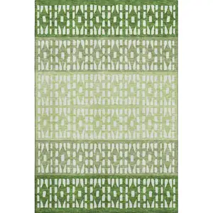 Photo of Green And Ivory Geometric Washable Area Rug With UV Protection