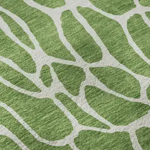 Photo of Green And Ivory Geometric Washable Area Rug With UV Protection