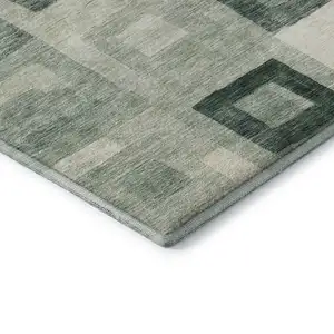 Photo of Green And Ivory Geometric Washable Area Rug With UV Protection