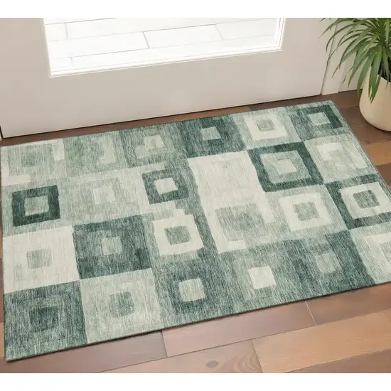 Green And Ivory Geometric Washable Area Rug With UV Protection Photo 1