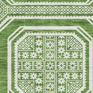 Photo of Green And Ivory Geometric Washable Area Rug With UV Protection
