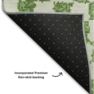 Photo of Green And Ivory Geometric Washable Area Rug With UV Protection