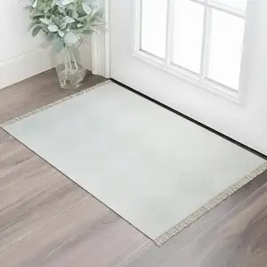 Photo of Green And Ivory Geometric Washable Area Rug