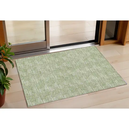 Green And Ivory Geometric Washable Indoor Outdoor Area Rug Photo 1