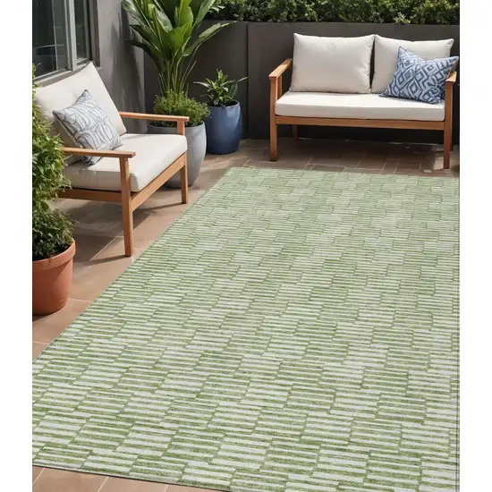 Green And Ivory Geometric Washable Indoor Outdoor Area Rug Photo 1