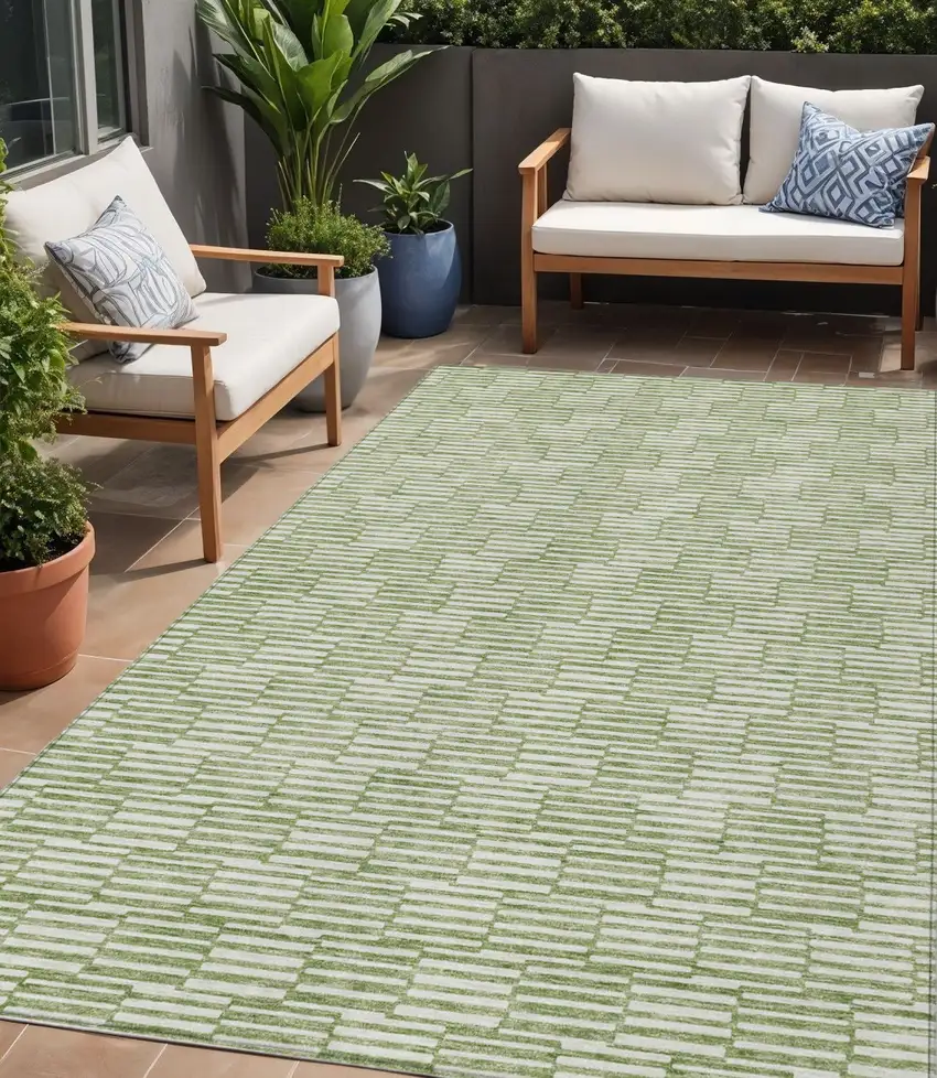 Green And Ivory Geometric Washable Indoor Outdoor Area Rug Photo 1