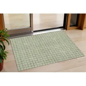 Photo of Green And Ivory Geometric Washable Indoor Outdoor Area Rug