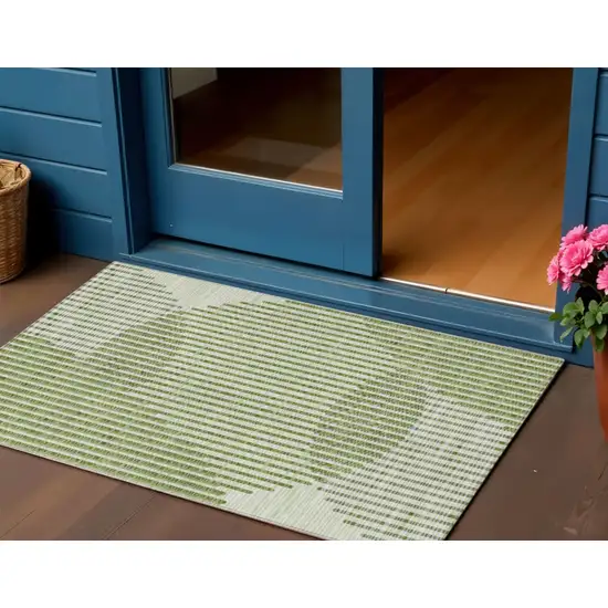 Green And Ivory Geometric Washable Indoor Outdoor Area Rug Photo 1