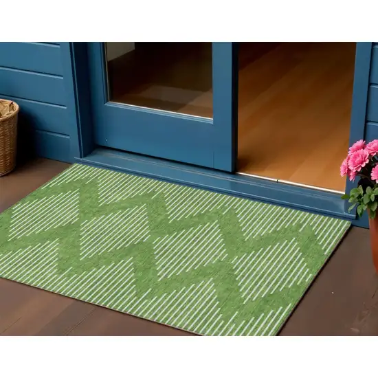 Green And Ivory Geometric Washable Indoor Outdoor Area Rug Photo 1